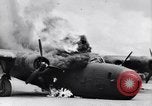Image of C-87 in flames China, 1943, second 22 stock footage video 65675030937