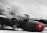 Image of C-87 in flames China, 1943, second 25 stock footage video 65675030937