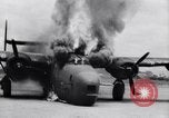Image of C-87 in flames China, 1943, second 30 stock footage video 65675030937