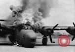 Image of C-87 in flames China, 1943, second 31 stock footage video 65675030937