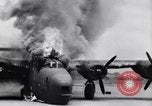 Image of C-87 in flames China, 1943, second 32 stock footage video 65675030937