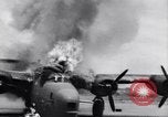 Image of C-87 in flames China, 1943, second 34 stock footage video 65675030937