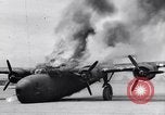 Image of C-87 in flames China, 1943, second 35 stock footage video 65675030937