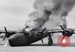 Image of C-87 in flames China, 1943, second 37 stock footage video 65675030937