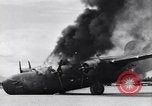 Image of C-87 in flames China, 1943, second 43 stock footage video 65675030937