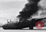 Image of C-87 in flames China, 1943, second 44 stock footage video 65675030937