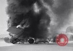 Image of C-87 in flames China, 1943, second 56 stock footage video 65675030937