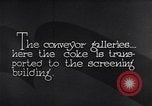 Image of coke screening and transport by Ford Dearborn Michigan USA, 1928, second 3 stock footage video 65675030984