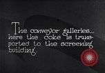 Image of coke screening and transport by Ford Dearborn Michigan USA, 1928, second 4 stock footage video 65675030984