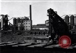 Image of Unloading ore at Ford plant Dearborn Michigan USA, 1929, second 1 stock footage video 65675030994