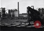 Image of Unloading ore at Ford plant Dearborn Michigan USA, 1929, second 4 stock footage video 65675030994