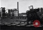 Image of Unloading ore at Ford plant Dearborn Michigan USA, 1929, second 8 stock footage video 65675030994