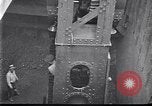 Image of Unloading ore at Ford plant Dearborn Michigan USA, 1929, second 15 stock footage video 65675030994