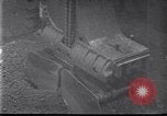 Image of Unloading ore at Ford plant Dearborn Michigan USA, 1929, second 21 stock footage video 65675030994