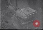 Image of Unloading ore at Ford plant Dearborn Michigan USA, 1929, second 23 stock footage video 65675030994