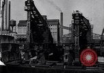 Image of Unloading ore at Ford plant Dearborn Michigan USA, 1929, second 28 stock footage video 65675030994