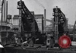 Image of Unloading ore at Ford plant Dearborn Michigan USA, 1929, second 29 stock footage video 65675030994