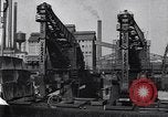 Image of Unloading ore at Ford plant Dearborn Michigan USA, 1929, second 30 stock footage video 65675030994