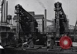 Image of Unloading ore at Ford plant Dearborn Michigan USA, 1929, second 32 stock footage video 65675030994