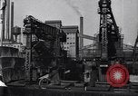 Image of Unloading ore at Ford plant Dearborn Michigan USA, 1929, second 34 stock footage video 65675030994