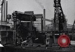 Image of Unloading ore at Ford plant Dearborn Michigan USA, 1929, second 35 stock footage video 65675030994