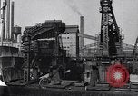 Image of Unloading ore at Ford plant Dearborn Michigan USA, 1929, second 37 stock footage video 65675030994