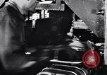 Image of Affixing car frame to chassis Dearborn Michigan USA, 1937, second 4 stock footage video 65675031007