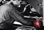 Image of Affixing car frame to chassis Dearborn Michigan USA, 1937, second 6 stock footage video 65675031007