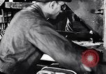 Image of Affixing car frame to chassis Dearborn Michigan USA, 1937, second 7 stock footage video 65675031007