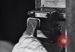 Image of Affixing car frame to chassis Dearborn Michigan USA, 1937, second 9 stock footage video 65675031007