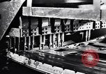 Image of Affixing car frame to chassis Dearborn Michigan USA, 1937, second 10 stock footage video 65675031007