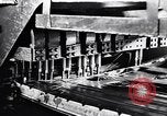 Image of Affixing car frame to chassis Dearborn Michigan USA, 1937, second 11 stock footage video 65675031007