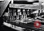 Image of Affixing car frame to chassis Dearborn Michigan USA, 1937, second 13 stock footage video 65675031007
