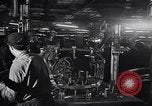 Image of Affixing car frame to chassis Dearborn Michigan USA, 1937, second 15 stock footage video 65675031007