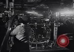 Image of Affixing car frame to chassis Dearborn Michigan USA, 1937, second 16 stock footage video 65675031007