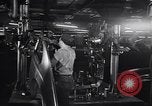 Image of Affixing car frame to chassis Dearborn Michigan USA, 1937, second 19 stock footage video 65675031007