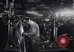 Image of Affixing car frame to chassis Dearborn Michigan USA, 1937, second 20 stock footage video 65675031007