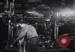 Image of Affixing car frame to chassis Dearborn Michigan USA, 1937, second 21 stock footage video 65675031007