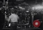 Image of Affixing car frame to chassis Dearborn Michigan USA, 1937, second 23 stock footage video 65675031007