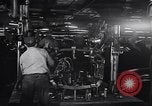 Image of Affixing car frame to chassis Dearborn Michigan USA, 1937, second 24 stock footage video 65675031007