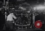 Image of Affixing car frame to chassis Dearborn Michigan USA, 1937, second 25 stock footage video 65675031007