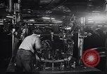 Image of Affixing car frame to chassis Dearborn Michigan USA, 1937, second 27 stock footage video 65675031007