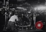 Image of Affixing car frame to chassis Dearborn Michigan USA, 1937, second 28 stock footage video 65675031007