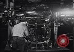 Image of Affixing car frame to chassis Dearborn Michigan USA, 1937, second 30 stock footage video 65675031007