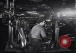 Image of Affixing car frame to chassis Dearborn Michigan USA, 1937, second 31 stock footage video 65675031007
