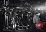 Image of Affixing car frame to chassis Dearborn Michigan USA, 1937, second 32 stock footage video 65675031007
