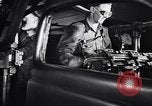 Image of Affixing car frame to chassis Dearborn Michigan USA, 1937, second 34 stock footage video 65675031007