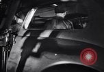 Image of Affixing car frame to chassis Dearborn Michigan USA, 1937, second 35 stock footage video 65675031007