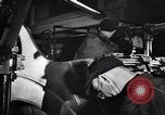 Image of Affixing car frame to chassis Dearborn Michigan USA, 1937, second 37 stock footage video 65675031007