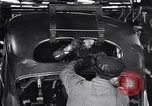 Image of Affixing car frame to chassis Dearborn Michigan USA, 1937, second 47 stock footage video 65675031007